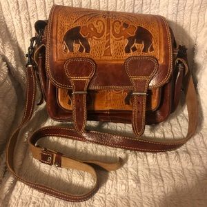All leather shoulder bag with elephant design